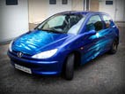 Аэрография на синем Peugeot 206 – «Бирюзовый прибой»